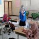 Pocket Book Panduan Penilaian Melalui E-Learning Platforms Bagi Guru IPA Tingkat SMP Di Kota Padang – Beritasumbar.com